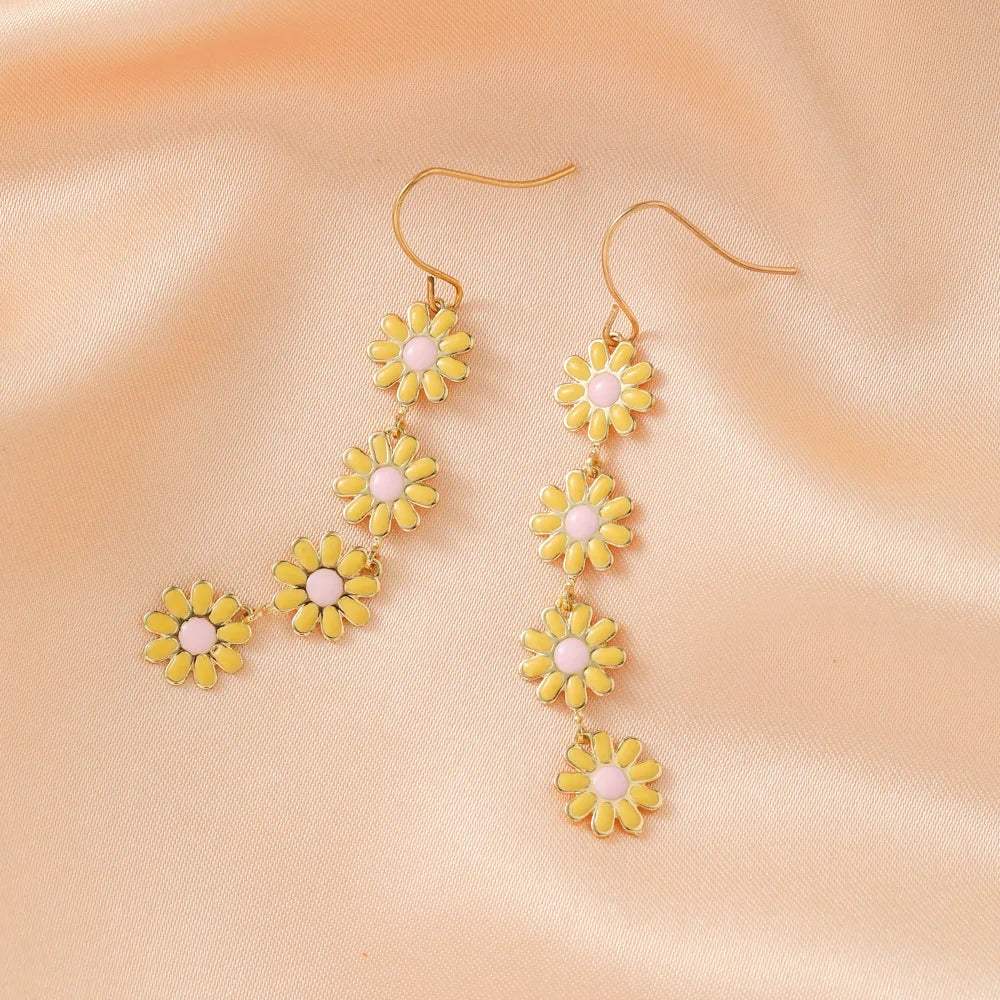 Retro Daisy Small Flower Earrings and crystal sparkle bowties and other style earrings by cliojames63.