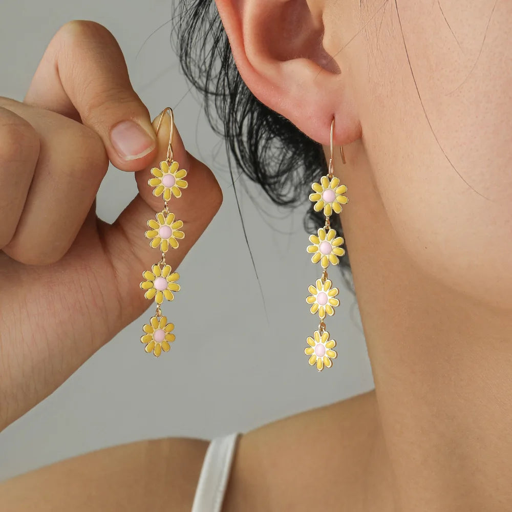 Retro Daisy Small Flower Earrings and crystal sparkle bowties and other style earrings by cliojames63.