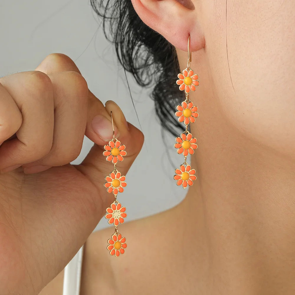 Retro Daisy Small Flower Earrings and crystal sparkle bowties and other style earrings by cliojames63.