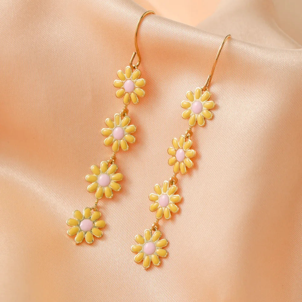 Retro Daisy Small Flower Earrings and crystal sparkle bowties and other style earrings by cliojames63.
